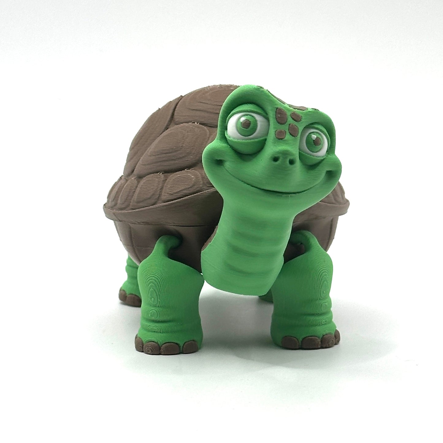 Toy turtle figurine with a white background