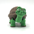 Toy turtle figurine with a white background