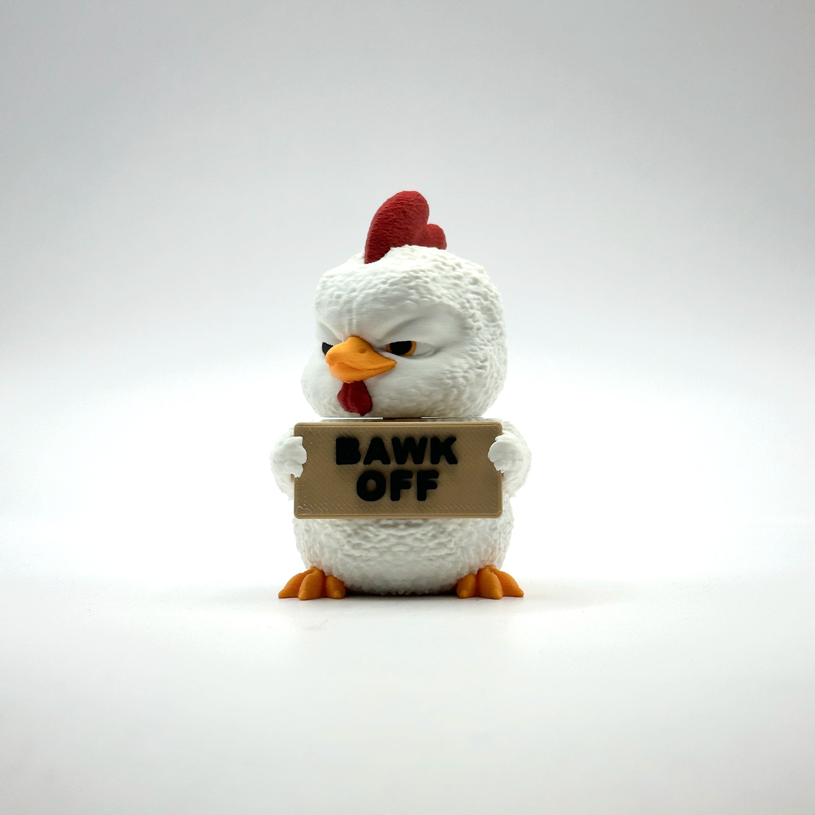 Bawk Off Rooster 3D printed desk buddy holding its sign, front view