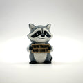 You're Trashy and I Like It Raccoon 3D printed desk buddy holding its sign, front view