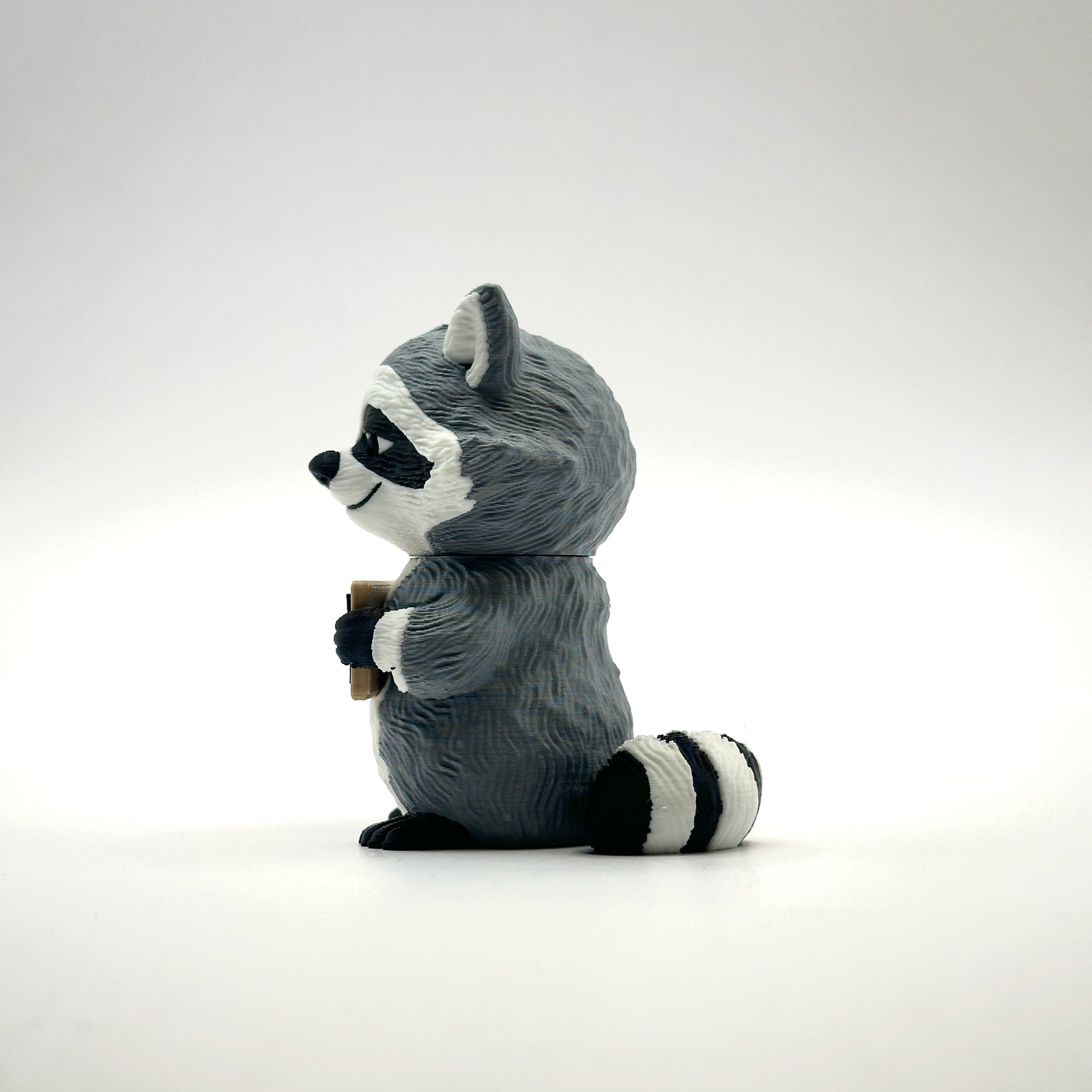 You're Trashy and I Like It Raccoon 3D printed desk buddy, side view